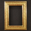 Carved and gilded frame in wood and plaster
