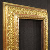 Carved and gilded frame in wood and plaster