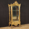 Elegant 19th century rocaille style gilded showcase