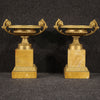 Pair of gilded bronze and yellow marble risers from the 20th century