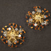 Pair of French wall lights in golden metal with colored glass