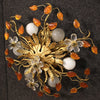 Pair of French wall lights in golden metal with colored glass