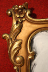 Sculpted and gilded Italian mirror