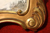 Sculpted and gilded Italian mirror