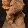 French sculpture in cement child with tambourine from 20th century