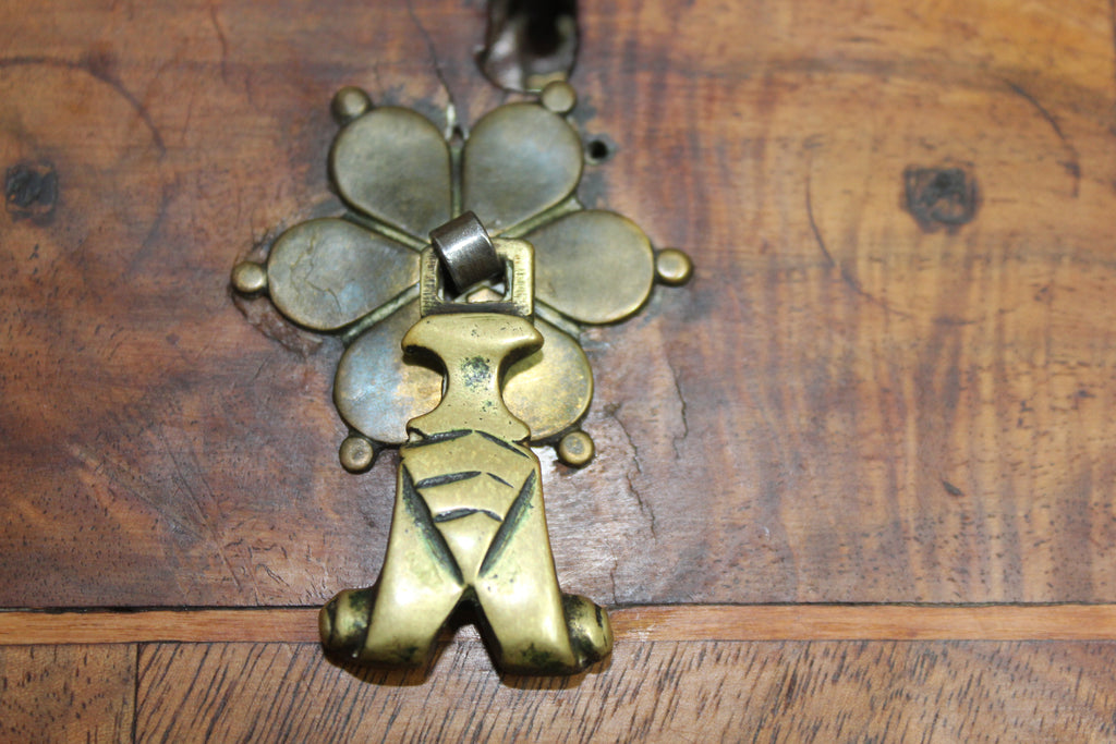 close-up of original brass drop handles and escutcheons on Queen Anne chest