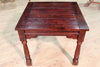 Square table in carved wood