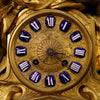 French clock in golden antimony