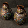 Pair of oriental metal vases from 20th century