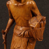 Indian character sculpture in exotic wood from 20th century
