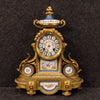 French clock in gilded bronze and brass with painted ceramic