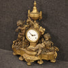 French clock in gilt bronze and antimony